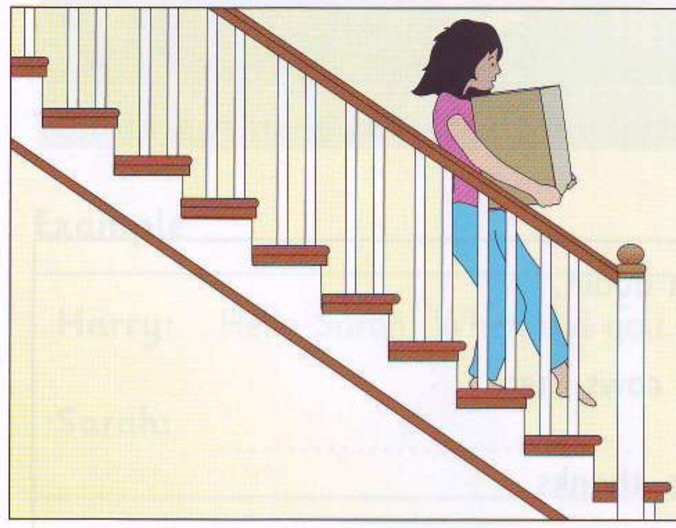 A girl carrying a box down the stairs