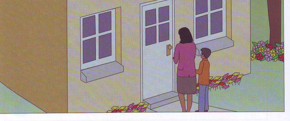 Mum and Michael at the front door at night