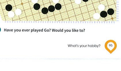 A Go board with black and white stones